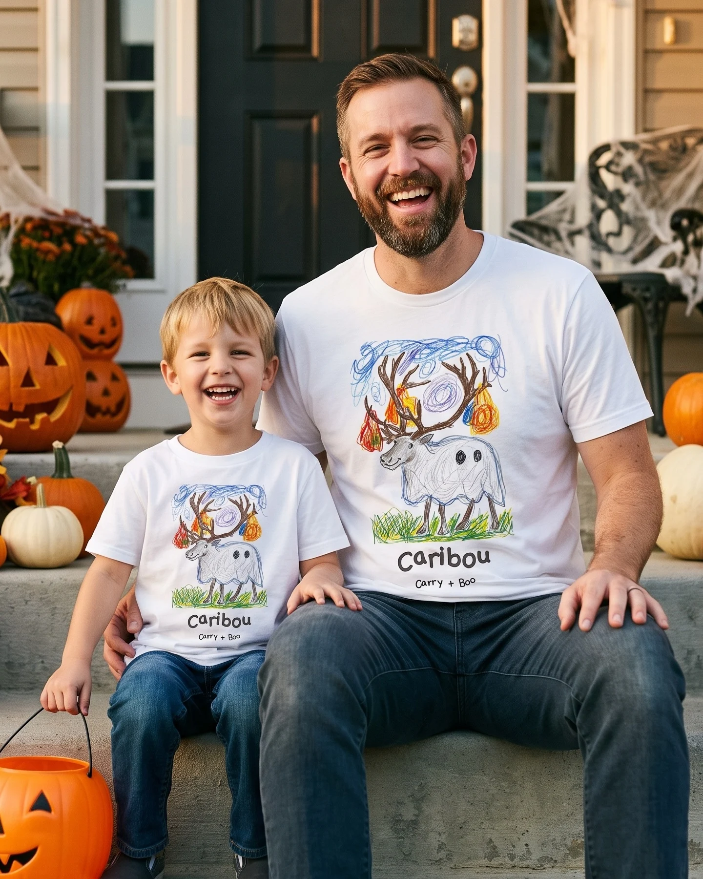 Dad and son wearing matching literally Caribou sketch t-shirts